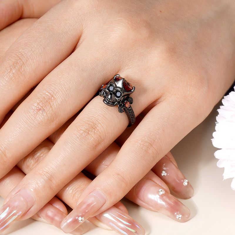 Garnet skull ring outlet